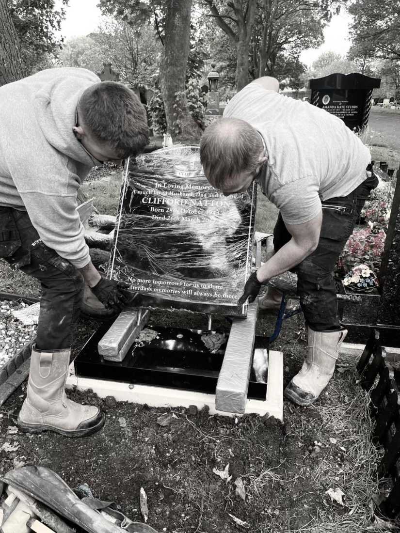 A memorial being fitted on site to BRAMM fixing standards